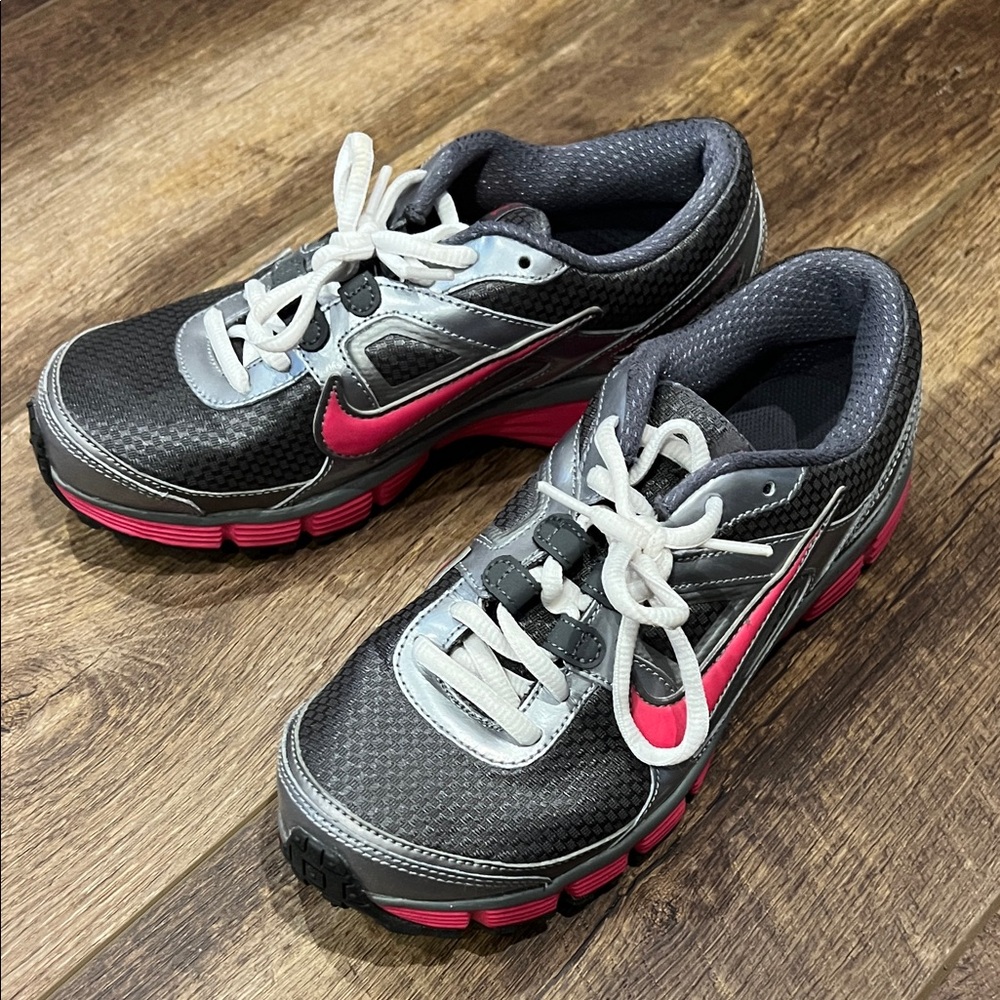 Nike Athletic Shoes with Pink and Gray Accents
